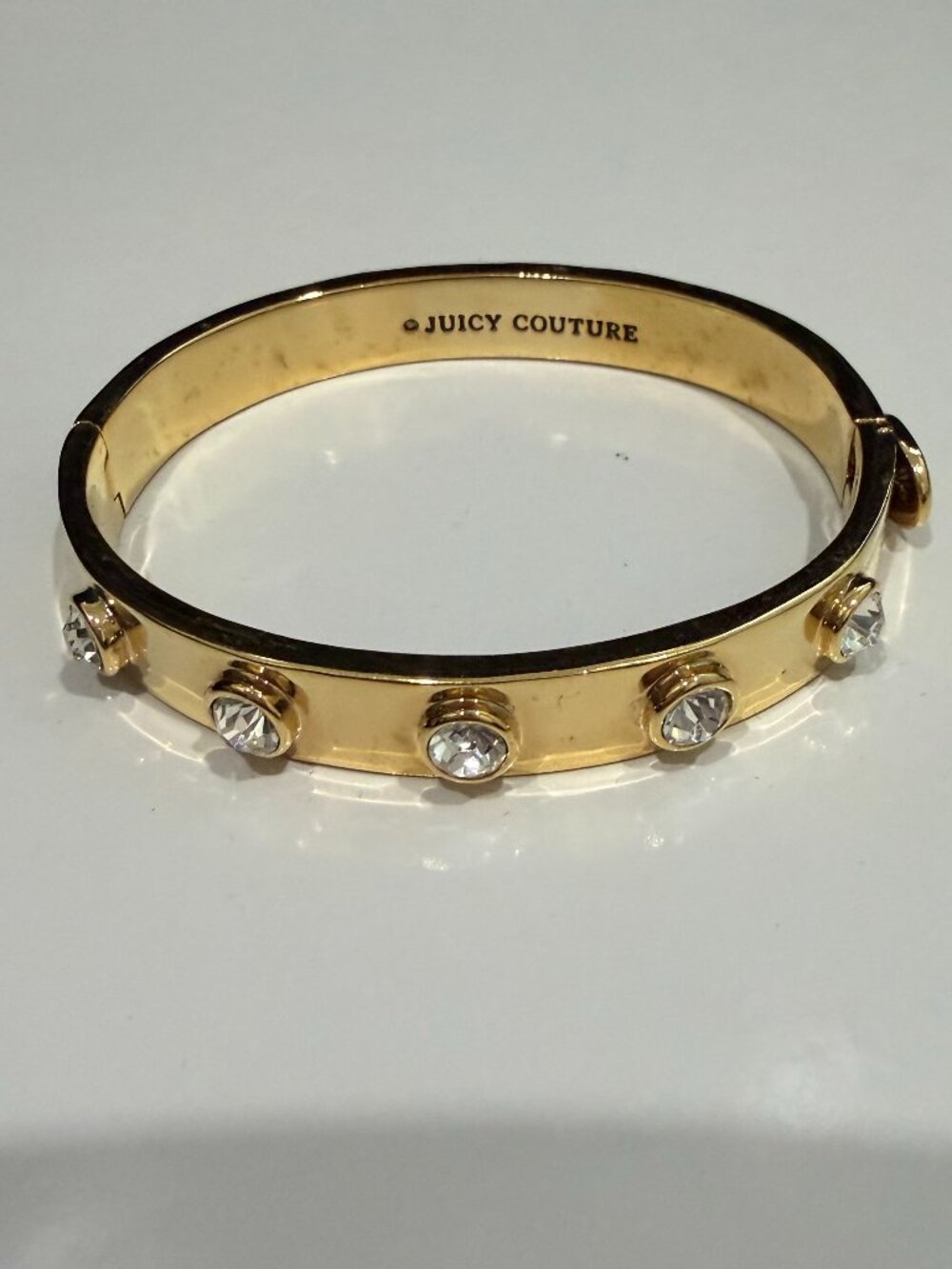 Authentic Juicy Couture Gold-Tone Hinged Bangle with bezel-set Crystals